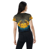 Woman wearing SurArt 66 print crop tee in urban setting.